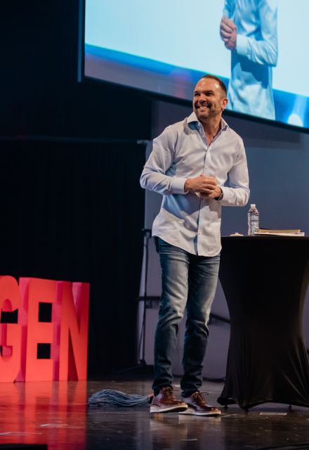 Tom speaking at the Summit