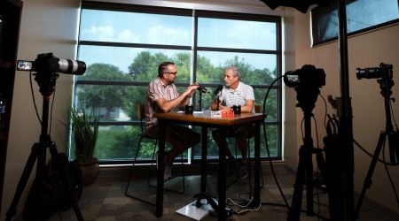 Tom speaking in his podcast studio