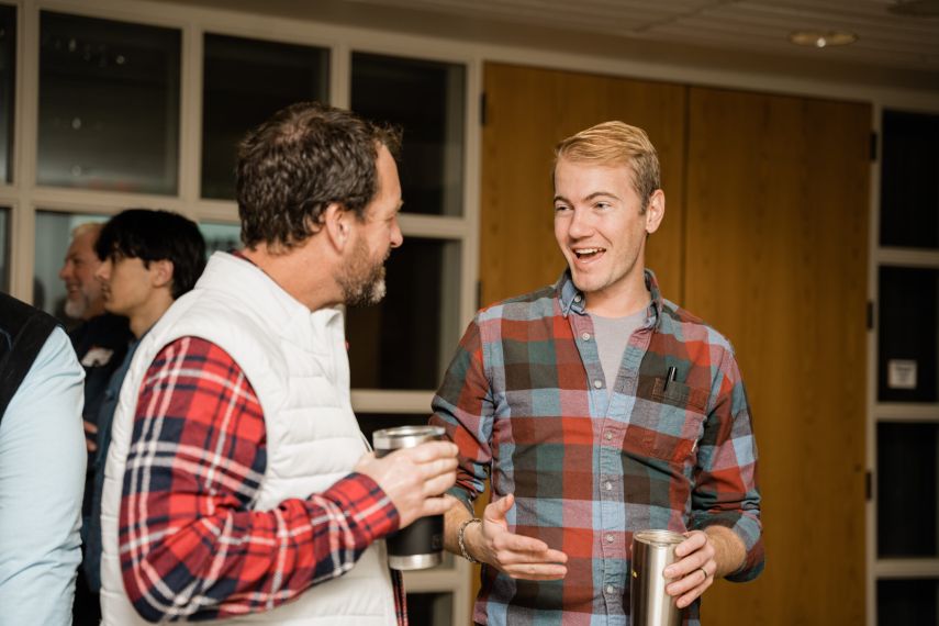 Man speaking in a podcast studio