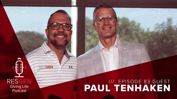 Tom and Paul standing together